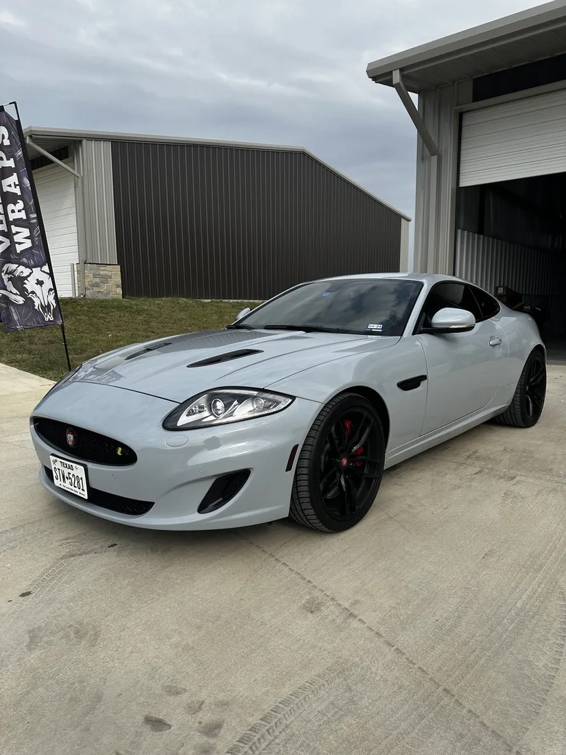 Satin grey color change wrap on a Jaguar — Full Curl Graphix
