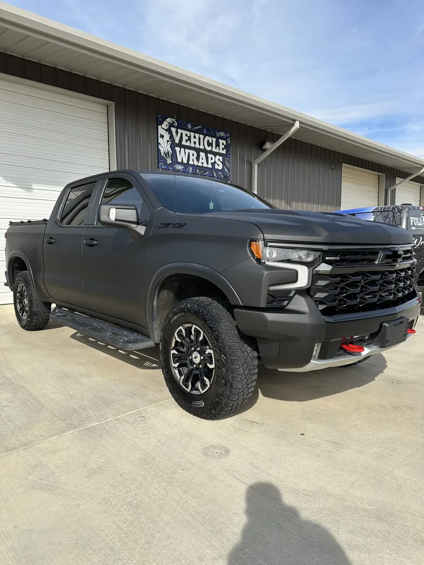 Matte black color change wrap on a Chevy truck — Full Curl Graphix
